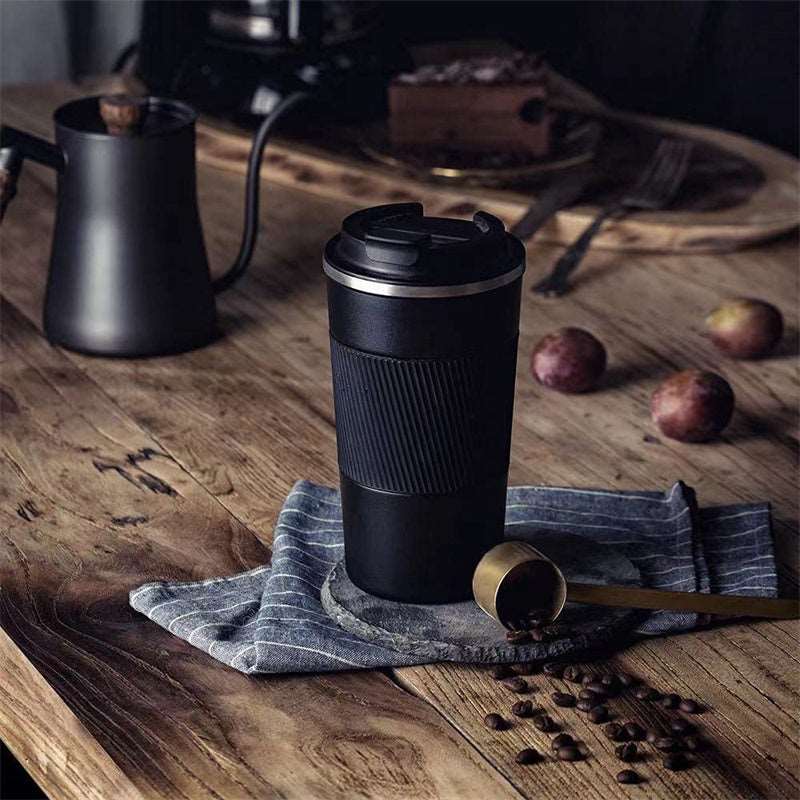 Double layer stainless steel coffee mug with non-slip rubber grip and bottom